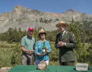 July 28,  2015--Tioga Road Rededication Ceremony-- A ceremony was held in Yosemite National Park to rededicate the Tioga Road. The highest road crossing of the Sierra at 9,945 feet, was originally dedicated on July 28, 1915. Pictured here (L to R) are Jerry Edelbrock, VP, Yosemite Conservancy, Laura Bush, Former First Lady and Co-Chair National Park Service Centennial, and Yosemite National Park Superintendent Don Neubacher. A "christening bottle" was broken over a ceremonial rock to reenact the original dedication, exactly 100 years ago. Photo by Al Golub/Yosemite Conservancy