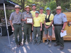 Representatives from the Yosemite National Park Preventative Search and Rescue (PSAR) program accept the Volunteer Program Award - photo NPS