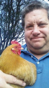 Mountain Area Chicken Chicks Brad Nelson holds a chicken 2016