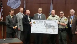 Board of Supervisors accept check for K9 program - photo Madera Deputy Sheriff's Association