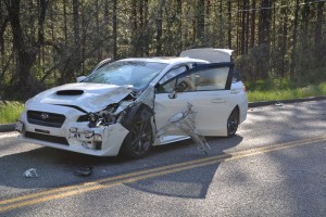 Subaru sedan on Road 274 crash - photo by Gina Clugston