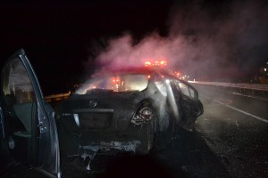 Burned out Nissan Altima - photo by Gina Clugston
