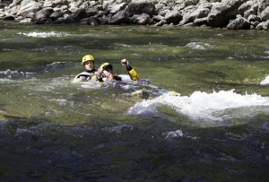 SAR_Demonstrates_swift_water_rescue_technique_-_defensive_swimming_-_2013_-_Photo_by_Virginia_Lazar