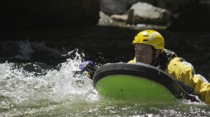 SAR_Mike_Pope_demonstrates_swift_water_rescue_technique_in_Merced_River_2013_-_Photo_by_Virginia_Lazar