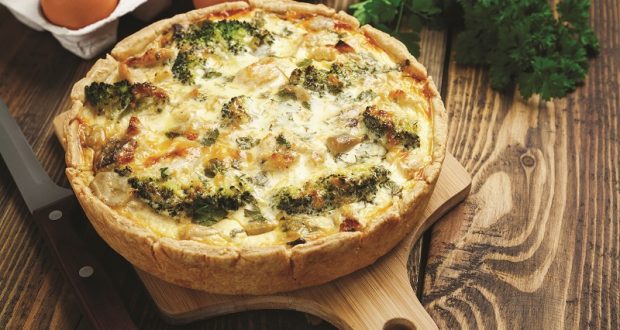 Image of a bacon, cheese, and broccoli quiche.