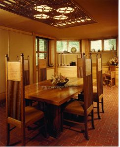 Image of the interior of a house designed by Frank Lloyd Wright.
