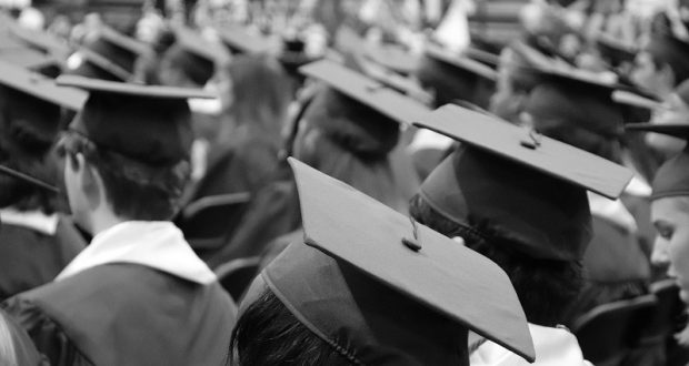 Black and white image of a graduation ceremony.