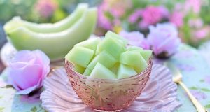 Image of a bowl of honey dew melons.