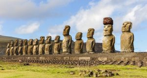 Image of Group of Moai On A Long Pedestal.