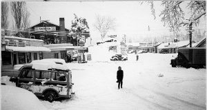 Image of a woman on a snowy street in North Fork, CA.