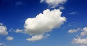 Image of a cloud against a blue sky.