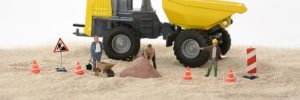 Image of toy road construction workers.