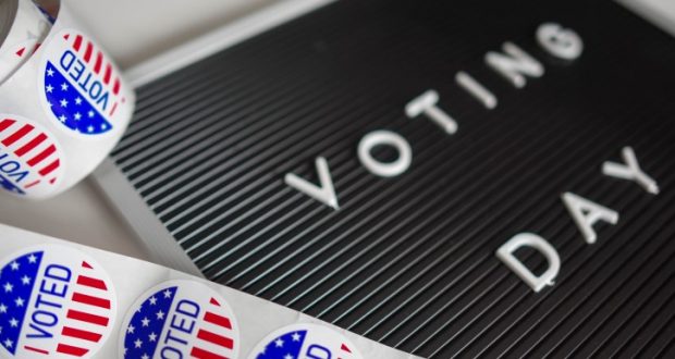 Image of a sign that says "VOTE."