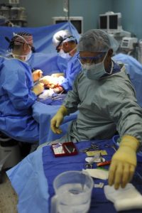 Image of doctors performing an operation.