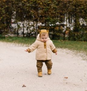 Image of a young child walking.