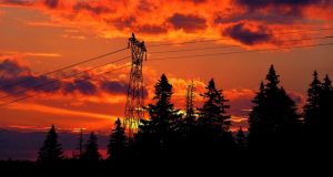 Image of some powerlines at sunset.