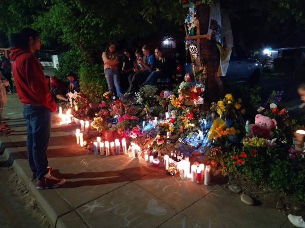 Image of a candlelight vigil. 