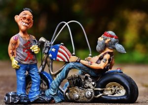 Image of a statuette of two bikers on their choppers.