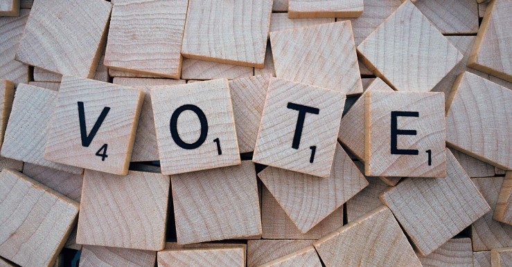 Image of Scrabble tiles spelling out VOTE.