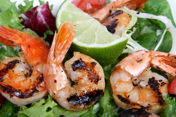 Image of grilled shrimp on a plate. 