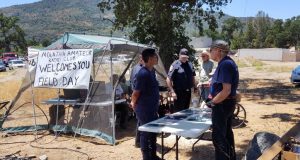 Image of MARC member Clyde Wheeler as he greets visitors at last year’s Field Day event and explains to them how amateur radio interfaces with emergency services.