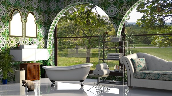 Image of a beautiful green-tiled bathroom overlooking an orchard. 
