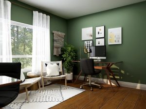 Image of a home office with green walls. 