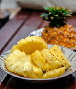 Image of chunks of pineapple on a plate. 
