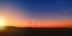 Image of electrical power lines at sunset.