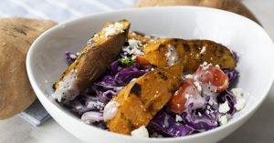 Image of Sweet Potato Wedge & Purple Cabbage Salad with Poppyseed Dressing.
