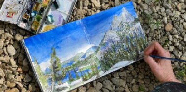 Image of a watercolor painting of the wilderness. Bright blue skies, tall mountains with a bit of snow on them, nice blue lakes, and lots of green trees.
