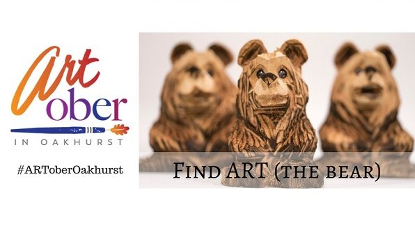 Image of flyer for Artober in Oakhurst. Has three wooden carved bears