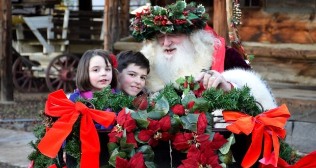 Image of Santa Claus and a couple of kids