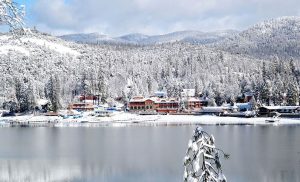 Image of The pines resort on bass lake in the winter time with lots of snow