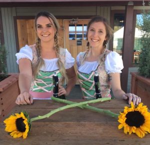 Image of two Oktoberfest beer girls. 