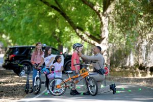 Image of CHP Officer and Children on Bicycles