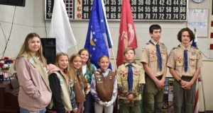 Image of Boy Scouts and Girl Scouts at the Elks' Veterans Day dinner.