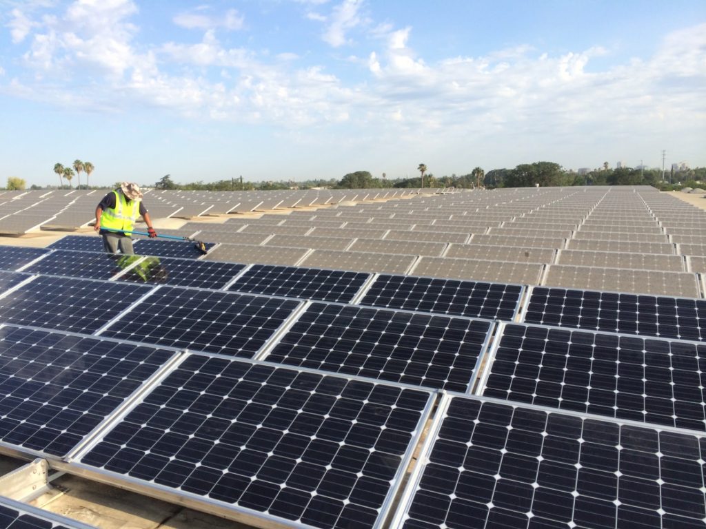 Image of Solar Panels being cleaned