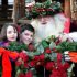 Image of two little kids with Santa Claus.