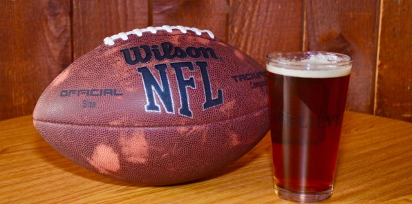 Image of a football and beer