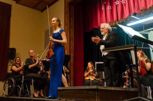 Image of brilliant Guest Soloist Dr. Ann Miller after a stunning 2019 performance of Tchaikovsky’s Violin Concerto with MYSO in Mariposa County High’s Fiester Auditorium.