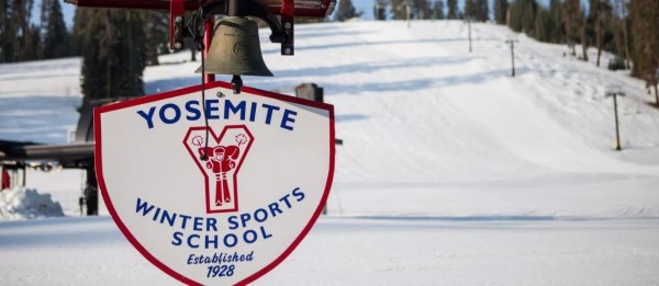 Image of a ski school sign at Badger Pass. 