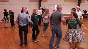 Image of people square dancing. 