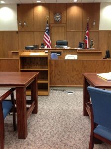 Image of the inside of a courtroom.