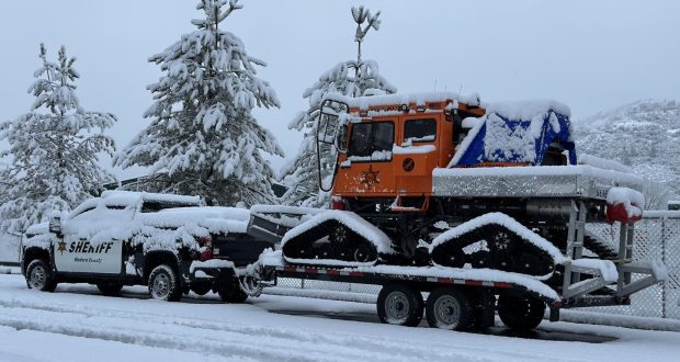 Image of Madera County Sheriff Truck Pulling Snow Cat