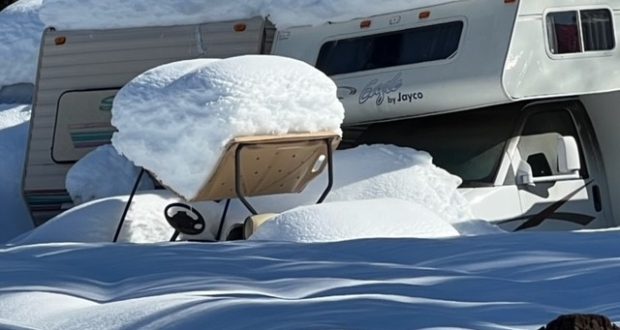 Image of snow covered campers