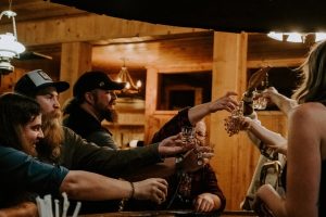 Image of people drinking at The Snow Line Saloon. 