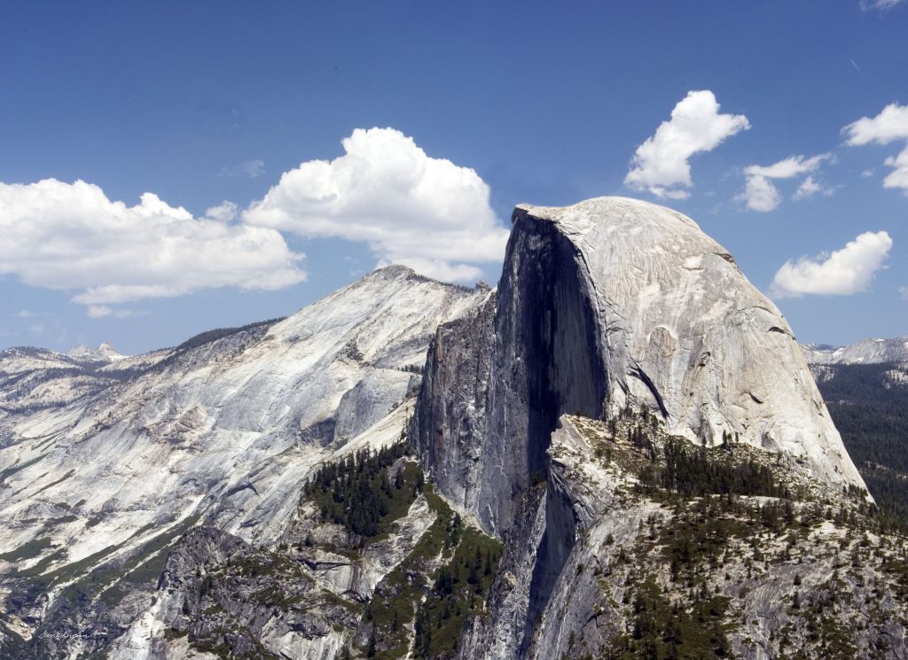 "Towering Monument" captures the awe-inspiring majesty of Half Dome in Yosemite
National Park. Gene Bryan’s photograph depicts the iconic granite formation in all its
grandeur, rising majestically towards the sky - standing as an inspirational towering
monument of natural wonder and beauty.