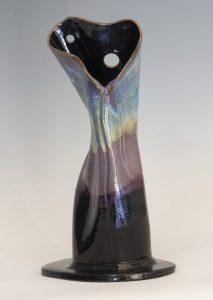 Phoebe Bryan’s sculpture is a beautiful piece of art that incorporates curves and shapes inspired by the female form, creating a striking and harmonious blend of elegance and sensuality that draws the viewer's eye and captivates the imagination.