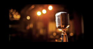 Image of a microphone on stage at The Snow Line Saloon.